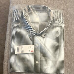 Uniqlo Men's Navy blue and White Striped Shirt. 
Size large. New with tags.